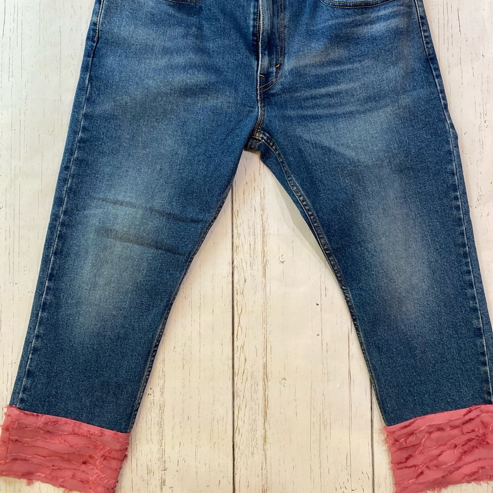 Vintage Levi capris with distressed pink fabric bottom